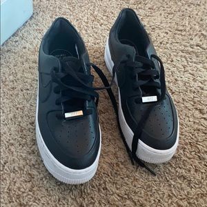 Nike black and white Air Force one’s